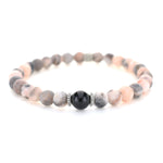 Armband i Zebra Jasper och Obsidian med Detaljer av Metall